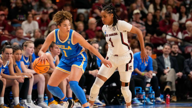 South Carolina Gamecocks guard Zia Cooke defends UCLA Bruins guard Kiki Rice.